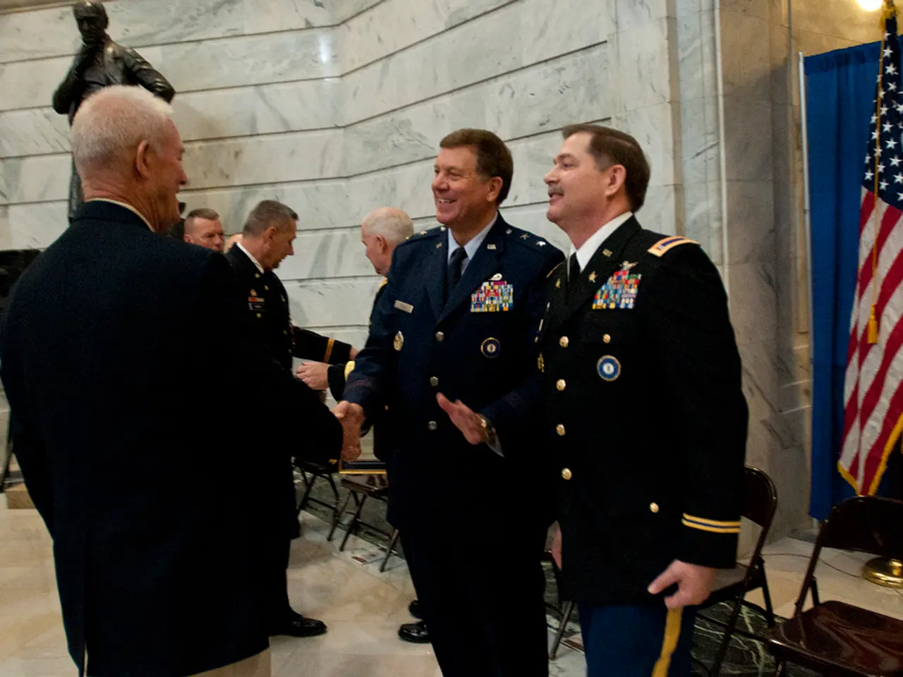 In this image there are people standing and shaking their hands, behind the people there are...