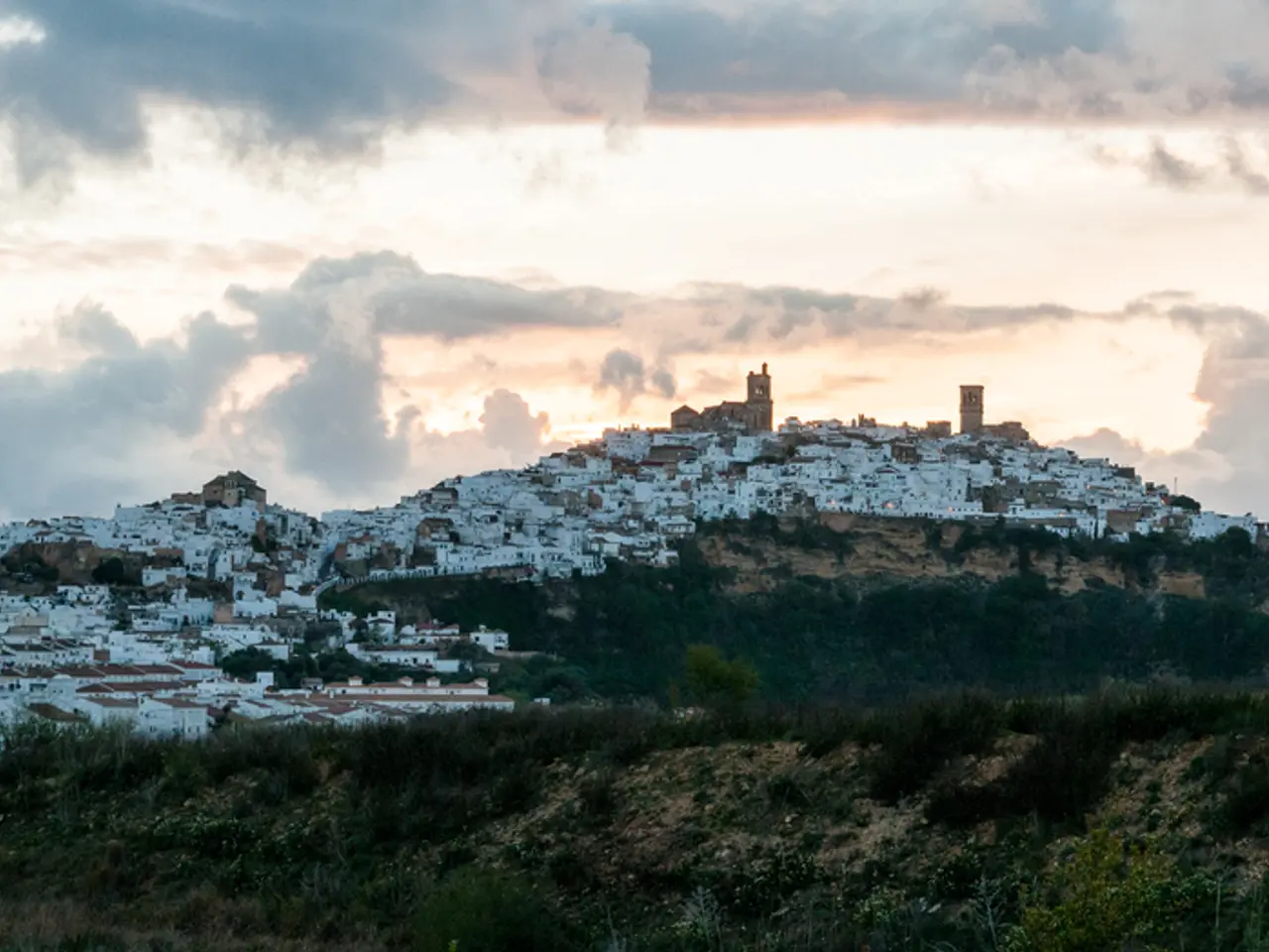 It is the beautiful view of the city. At the top there is the sky. There are so many houses and...