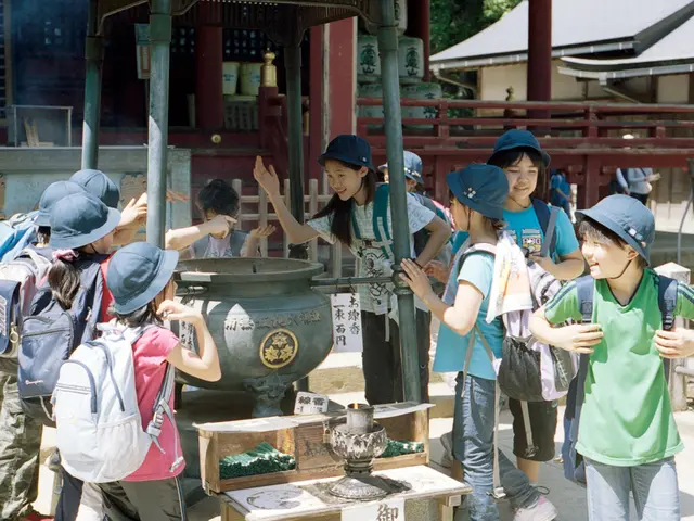 In this image there are a few kids wearing bags are standing with a smile on their face, around...
