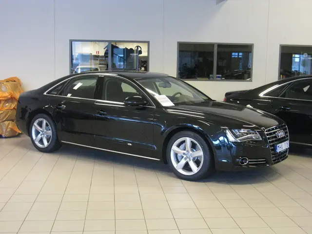 In this picture we can see cars, behind the cars we can find few plastic bags and glasses.