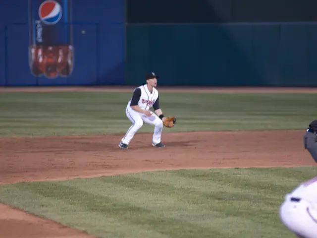 In this image in the center there is grass on the ground and there are persons standing. In the...