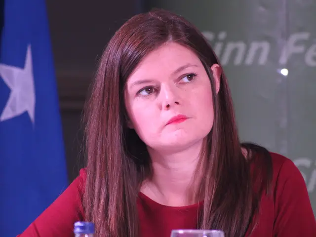 Here in this picture we can see a woman in a red colored dress present over a place and in front of...